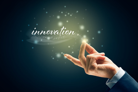 Innovation concept - to be innovative is easy as snap fingers. Magic of business innovation concept.の写真素材