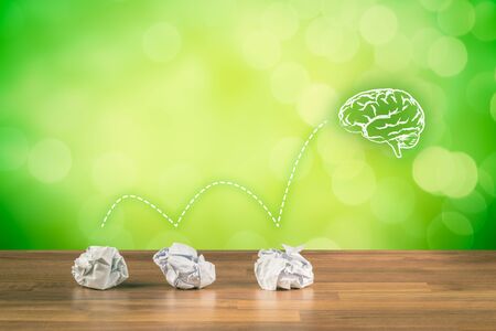 Creative process concept - from failed idea to successful idea (problem solution). Icon of the brain representing idea.の写真素材