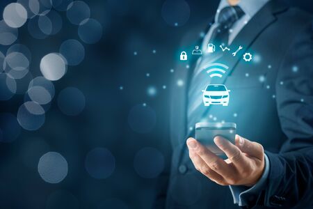 Intelligent car, intelligent vehicle and smart cars concept with smart phones. Symbol of the car and information via wireless communication about security, parking location, fuel, drive analysis, service and car settings.の写真素材