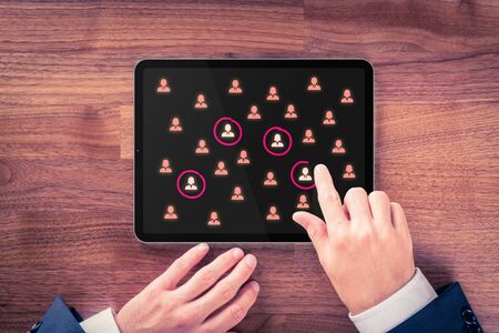 Target audience digital tablet app, market segmentation, customers care, customer relationship management (CRM) and team building concepts.の写真素材