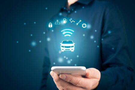 Intelligent car app on smart phone concept, intelligent vehicle and smart cars concept. Symbol of the car and information via wireless communication about car.の写真素材