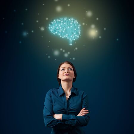 Artificial intelligence (AI), machine deep learning, data mining, and another modern computer technologies concepts with young woman scientist. Brain in PCB design representing artificial intelligence.の写真素材
