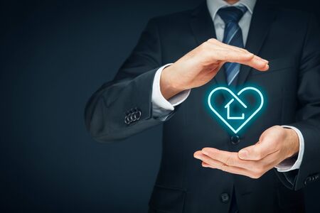 Real estate and insurance agent love his work. Property insurance and security concept.の写真素材