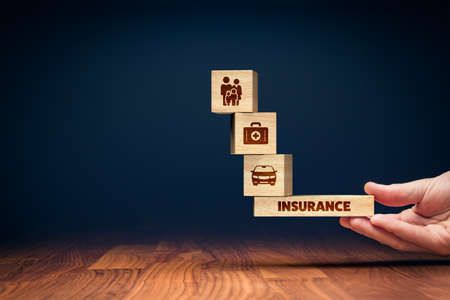Insurance balance concept. Insurance agent offer insurance of family and life, health and car.の写真素材