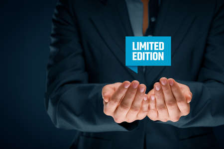 Limited edition concept - exclusive business model and marketing offer. Businesswoman hold virtual label with text limited edition.の写真素材