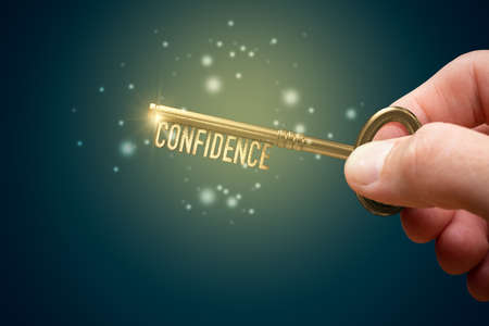 Key to your confidence is in your hand. Personal development and self-confidence concept.の写真素材