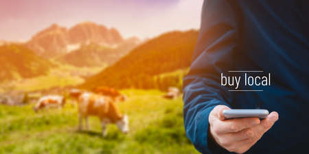 Buy local business model concept. Smart phone user buy agriculture products from local farmer. User...