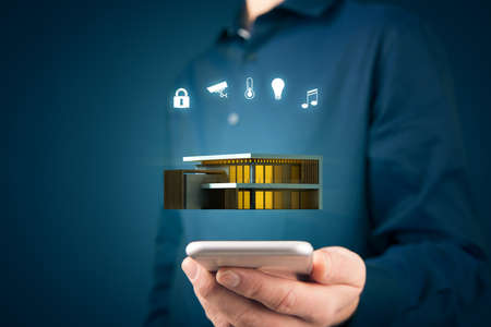 Smart home concept with modern villa, intelligent house, and home automation app security concept. Smart home app on smart phone.の写真素材