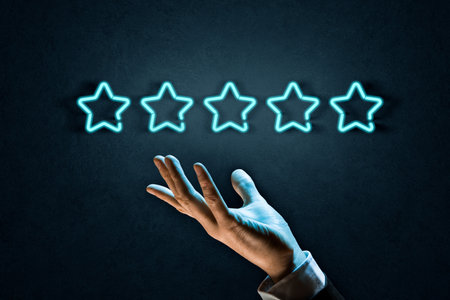 Feedback, review and increase rating concepts with five stars. Businessman represented by his hand and neon light design five stars.の写真素材