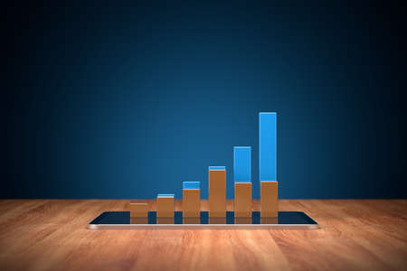 Growing income and stabilized costs concept with digital tablet. Increasing graph of incomes...