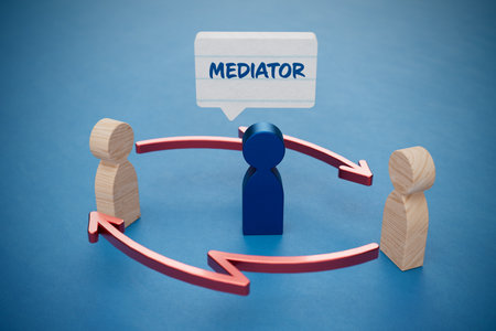 Mediation helps to find solutions for disputes and conflicts and to reach an agreement. Mediator represented by blue wooden piece figurine.の写真素材