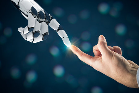 Human and artificial intelligence (AI) and robot cooperation concept. Human hand touch robotics (humanoid or android) hand. Industry 4.0 and artificial intelligence (AI) concepts.の写真素材