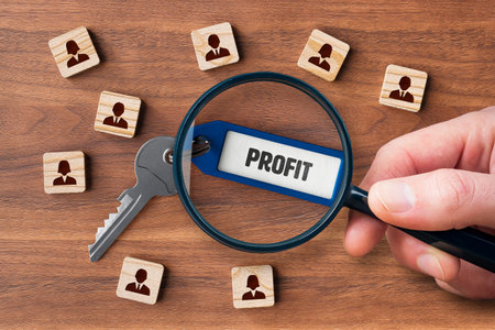 A well-functioning team and human resources is the key to the company's profit. Human resources concept with key, key tag and wooden cubes with people symbol.の写真素材