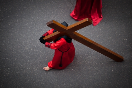 Nazareno carrying the Holy Cross as penitence  Holy Week in Valladolid, Spainのeditorial素材