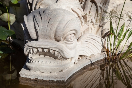 mythological figure of a fish in a pond  Monserrate Palace, in the village of Sintra, Portugalの写真素材