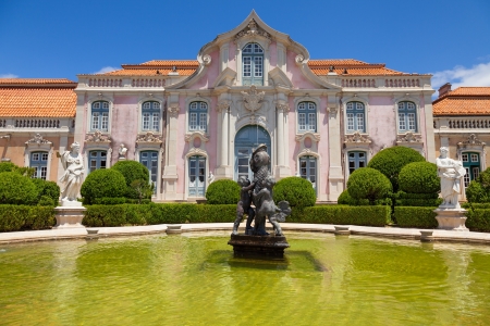 Queluz, Portugal - July 4, 2012: The Ballroom wing of Queluz National Palace behind a large pond. Municipality of Sintra, Lisbon district, Portugalのeditorial素材