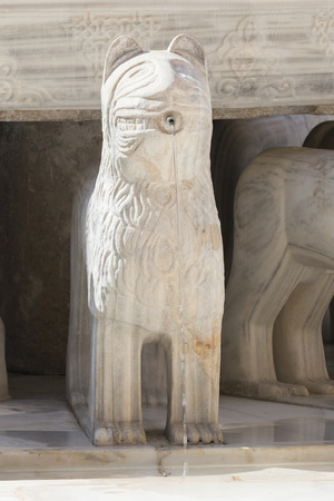 Granada, Spain - October 03, 2013: White marble lion in the fountain of the Court of Lions. Alhambra palace, Granada, Spainのeditorial素材