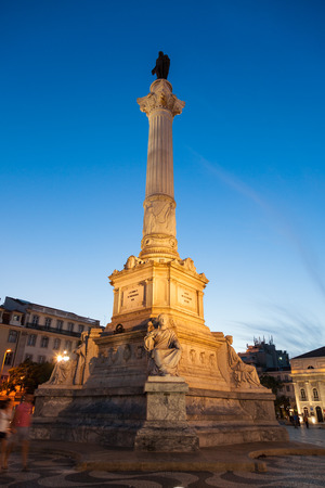 Dom Pedro IV square (also know as Rossio square) at dusk. Dona Maria II National Theatre in the background. Lisboa, Portugalのeditorial素材