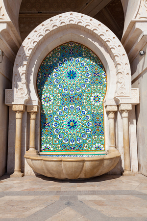 Decorated fountain in the facade of Hassan II mosque in Casablanca, Moroccoのeditorial素材