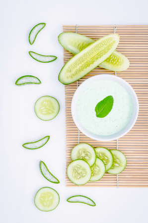 Spa concept, Homemade skin care and body scrub with natural ingredients aloe vera ,lemon and cucumber set up on on wooden background.の写真素材