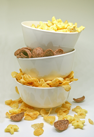 Cornflake cereals in a white bowl. Easy breakfast for kids. Quick breakfast.