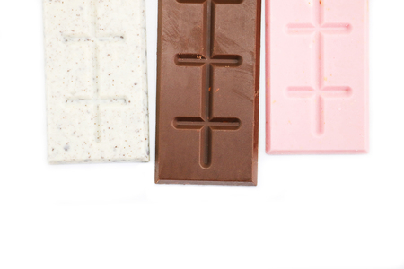 chocolate bar stack isolated on white background. Sweet chocolate, strawberry chocolate, chocolate...