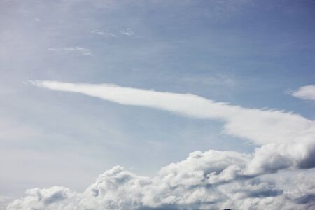 clouds and blue sky background.