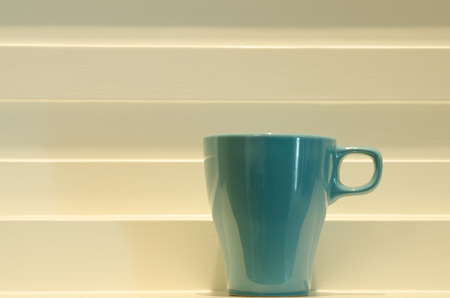 Blue Mug On Step White Background. Interior Decoration.の写真素材
