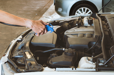 Cleaning Car Engine By Air Gunの写真素材