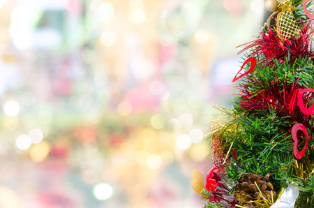 Decorated Christmas Tree On Blurred And Bokeh Backgroundの写真素材