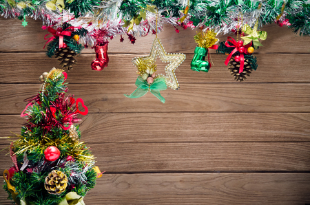 Decorated Christmas Tree On Wood Board Background.の写真素材
