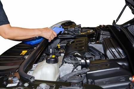 Hand Cleaning Car Engine By Air Gun Pressure.の写真素材