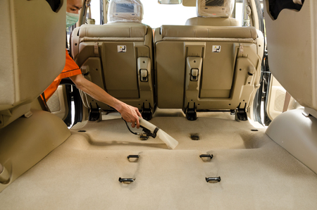 Professional  Cleaning Of Interior Back Seats Carpet SUV Model Cars By Wet Vacuum Machine. の写真素材