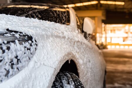Foam Bubble On White Car Surface, Car Wash Service.の写真素材
