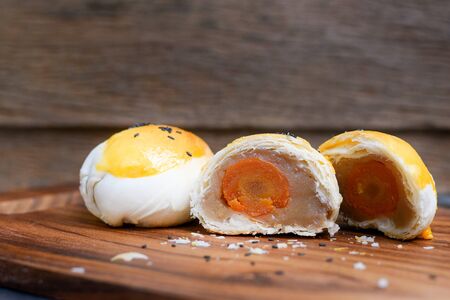 Dilicious Moon Cake Taro Jam And Salted Egg Yolk Filled Inside, Chinese Dessertの写真素材