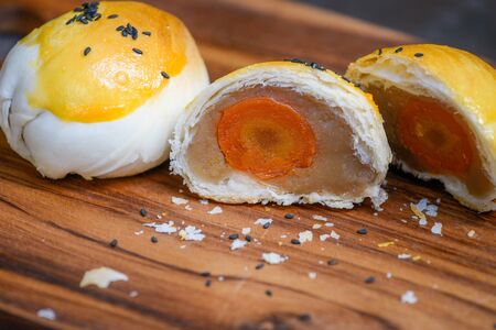 Dilicious Moon Cake Taro Jam And Salted Egg Yolk Filled Inside, Chinese Dessertの写真素材