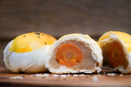Dilicious Moon Cake Taro Jam And Salted Egg Yolk Filled Inside, Chinese Dessertの写真素材