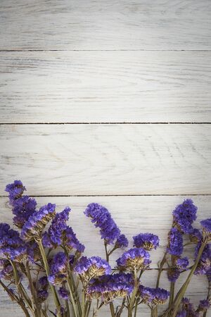 Wooden Fence Background And Blue Flowers. Nature Background.の写真素材