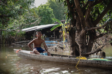UBON RATCHATHANI, THAILAND- SEPTEMBER 22 : Children Ride On Boat In Flood Area On September 22, 2019...