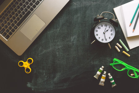 Back to school, top view flat lay concept with various educational accessories on blackboardの写真素材