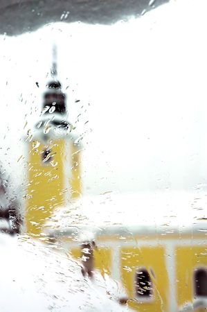 View over church from inside of the roomの写真素材