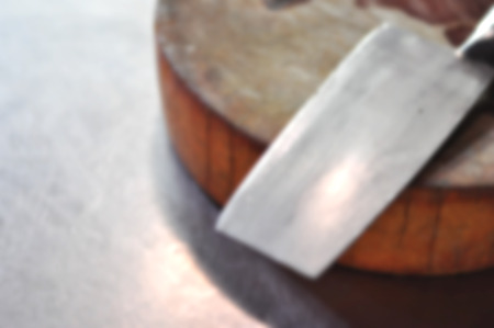 cleaver on block in chinese kitchen blur background