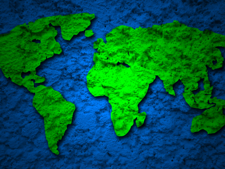 green grunge earth map on a blue background 1