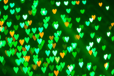 Cute heart shaped bokeh light at night.の写真素材