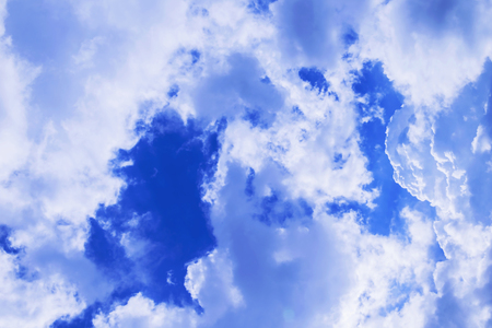 The big white clouds float in the skyの写真素材