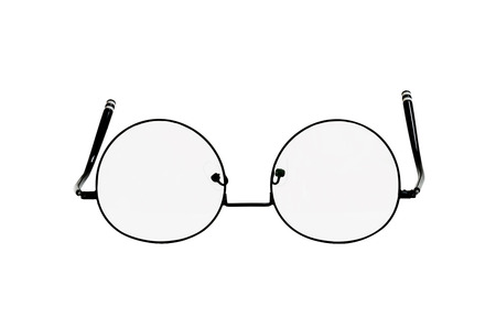 Black steel glasses look almost circular, the legs are round glasses, the ends of the glasses have white circles.の写真素材