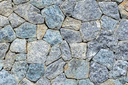 The stones are arranged in a rectangular, hexagonal, hexagonal, yellow, blue, black, whiteの写真素材