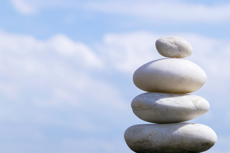 Spherical stones Lay up bundles of 4 white, the background is clear sky. Nature is the beauty of this world.の写真素材