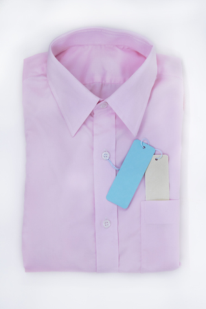 Shirt pink Have to fold neatly, The price tag is attached to the button and put in the pocket.の写真素材