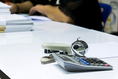 Office equipment is important to help make the job even more effective, pen, scissors, calculator, calculator, counting machine, A reminder paper, Cutting, The paper-clip.の写真素材